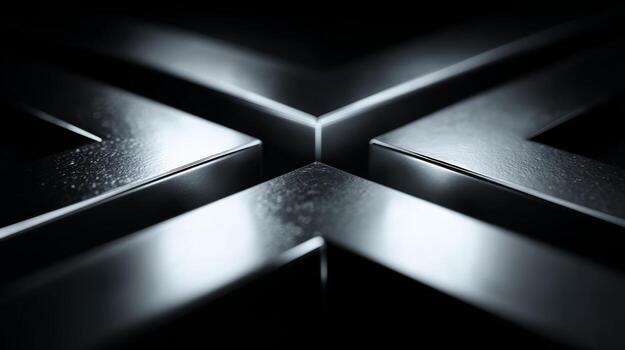 A close-up view of intersecting metallic surfaces, reflecting light in an abstract arrangement. photo
