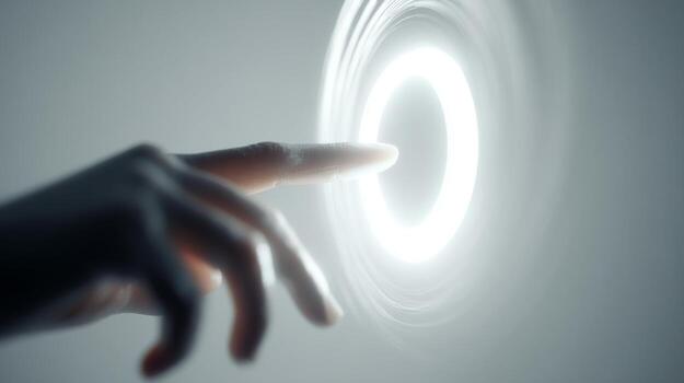 A close-up of a human hand reaching out to touch a glowing circular light, creating a sense of connection and curiosity. photo
