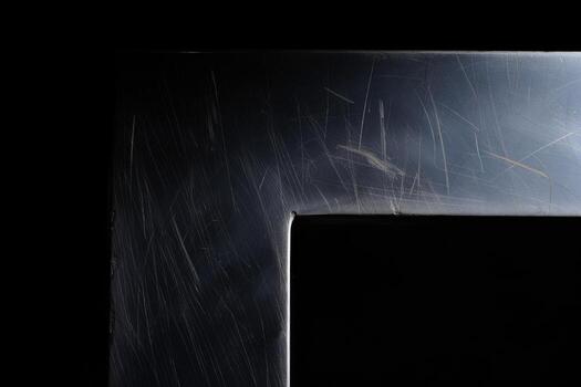 A black and white photograph of a metal frame photo