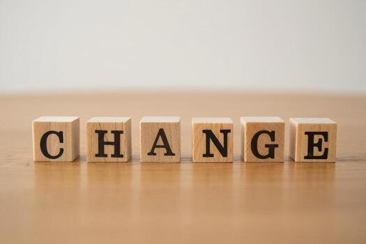 Change block on wooden table photo