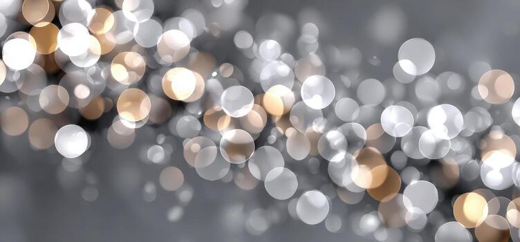 Abstract bokeh background featuring shimmering silver and gold circles of light, creating a dreamy atmosphere with a soft gradient and blurred effect for artistic design purposes photo