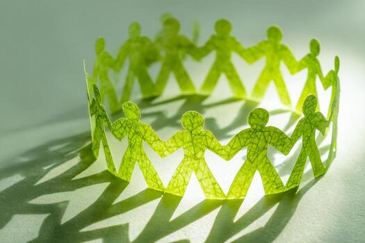 Symbolic representation of unity and community with paper chain links forming a circle photo