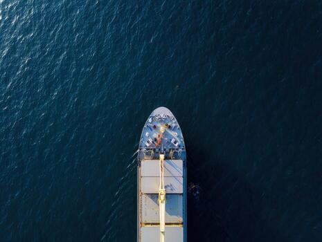 An aerial view of a ship in the ocean photo
