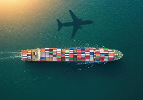 Massive container ship sails across ocean with airplane shadow overhead symbolizing global logistics and fast delivery in modern commerce. photo