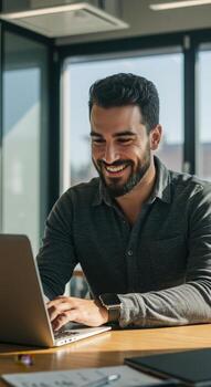 Confident businessman smiling while working on laptop in modern office, showcasing productivity and professional success. photo