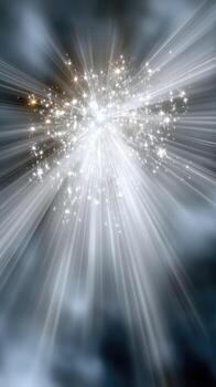 Bright light burst with shimmering particles radiating from a central point, creating a magical effect in a dark setting during nighttime photo