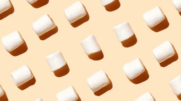 Marshmallow pattern on beige background overhead perspective copy space photo