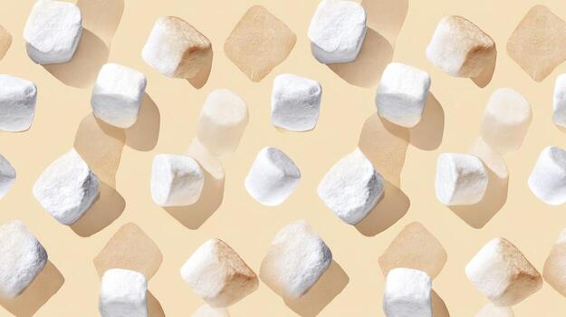 Marshmallows pattern on beige background overhead composition photo