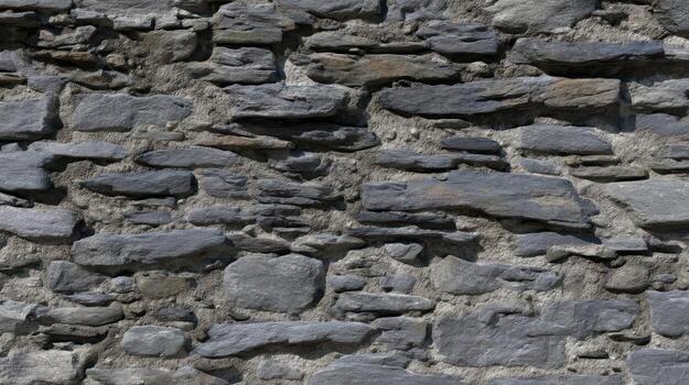 Textured stone wall background natural building material - photo