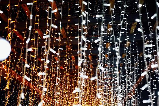 Bright and colorful string lights create a festive atmosphere at an evening gathering photo