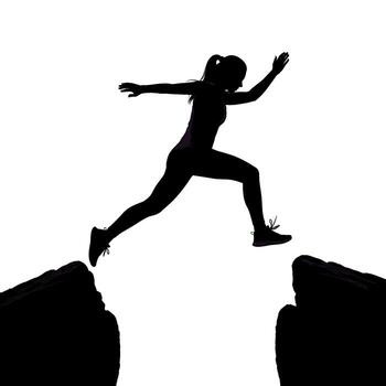 Silhouette of a determined woman leaping across a chasm between two rocks symbolizing overcoming challenges and taking risks with courage and confiden vector