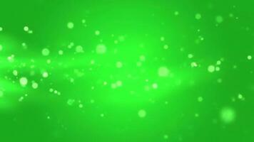 abstrakt grön bokeh bakgrund med gnistrande ljus partiklar och subtil rörelse för festlig . video