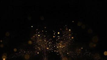 gyllene partiklar skimrande och flytande uppåt på en svart bakgrund skapande en magisk effekt. video