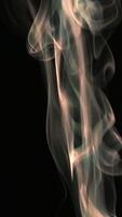A mysterious image of white smoke rising against a black background. video
