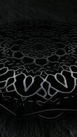Black Ornament with Metallic Reflection in Endless Rotation, Enhanced by Unique Charcoal Background and Deep Dark Texture Template video