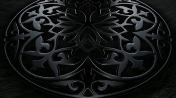 Elite Black Ornament Seamlessly Turning in Loop with Premium Charcoal Texture Background and Brilliant Metallic Surface Reflection video