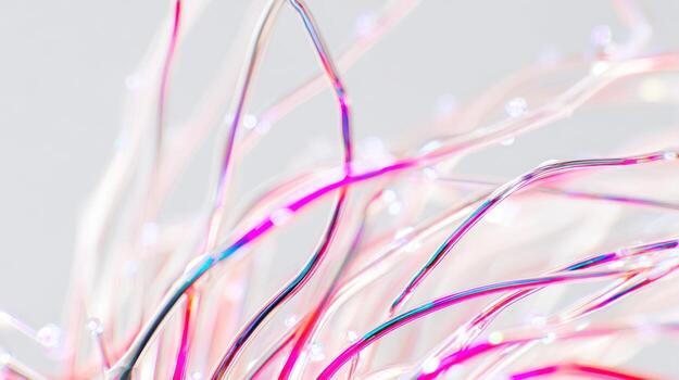 Abstract close up of colorful illuminated strands against a soft grey backdrop photo