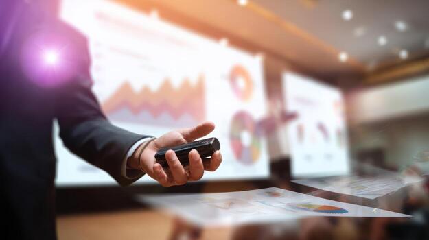 Businessman presenting data charts during seminar with modern presentation tools photo