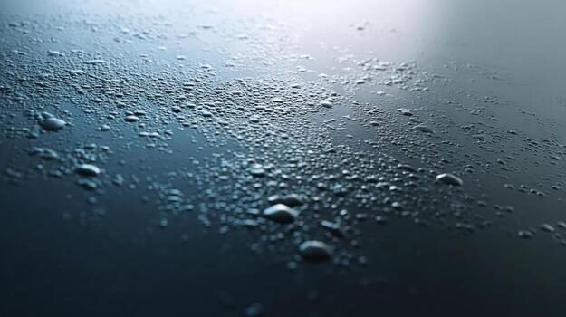 Close up of water droplets forming on a smooth surface abstract texture photo