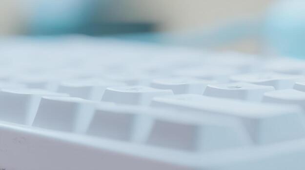 Close up of a white keyboard with soft focus background business and technology photo