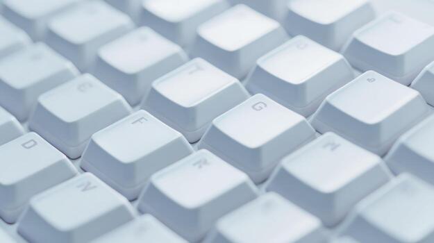 Close up of a white keyboard with angled perspective and clean lines photo