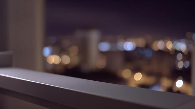 Evening cityscape blurred lights across a balcony with a modern railing design photo