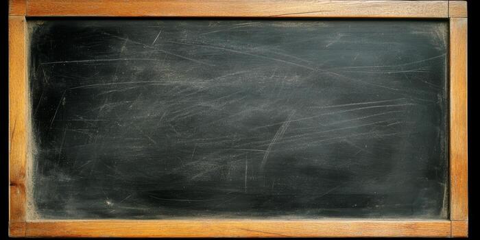 Blank blackboard with a textured surface and wooden frame, ideal for writing, drawing, and educational activities in various settings photo