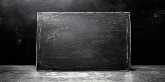 A smooth, blank blackboard with a clean surface ideal for notes, drawings, or educational activities in classrooms or creative spaces photo