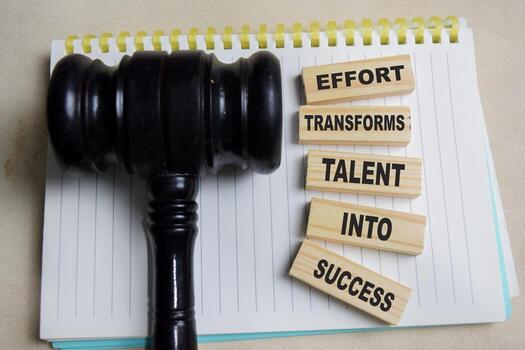 Effort transforms talent into success on stacked wooden cubes on the table. Business and finance concept photo