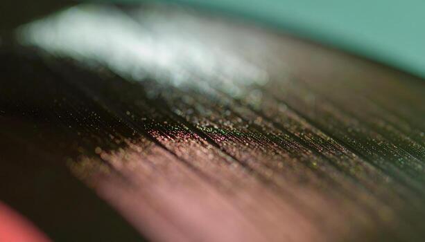 Macro Shot of Vinyl Record Grooves with Light Reflections. photo