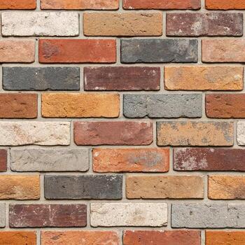 A flat seamless pattern of reclaimed multicolor bricks, ranging from red to brown, orange, and gray, with uneven tones and subtle surface scratches photo
