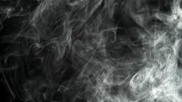 Dark smoke patterns on a black background video