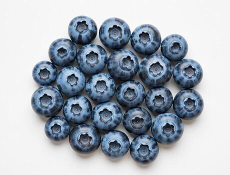 Freshly picked blueberries forming a delicious pattern on a white background photo