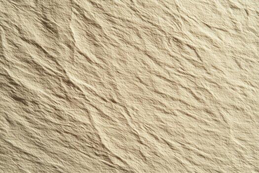 Close-up of wrinkled beige canvas texture with subtle creases photo