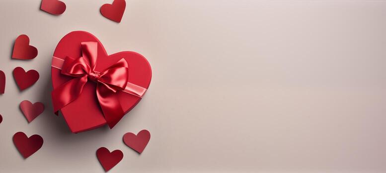 Festive box in the shape of a heart with a bow. Banner with place for text, copy space for Valentine's day, mother's day and date. Romantic banner with copyspace photo