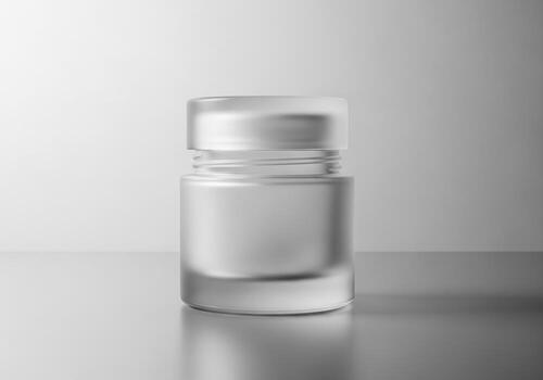 Frosted glass jar isolated on white background photo