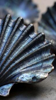 Iridescent Shell Shards. A Macro View of Ocean's Metallic Bloom and Textured Depths photo