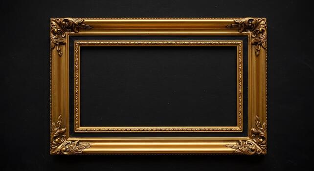 Elegant Gold Decorative Frame on Black Background Suitable for Art Display photo