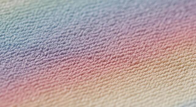 A close up of a rainbow colored fabric photo