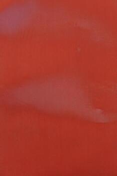 Smooth red background with subtle texture for creative design projects photo