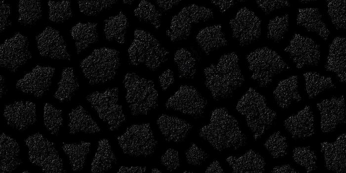 This dark abstract background features an irregular pattern of sparkling granular shapes providing a textured surface photo