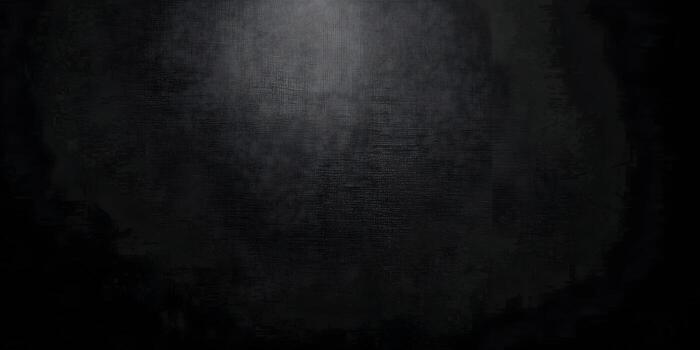 A dark subtle textured background has a spotlight creating a sophisticated design photo