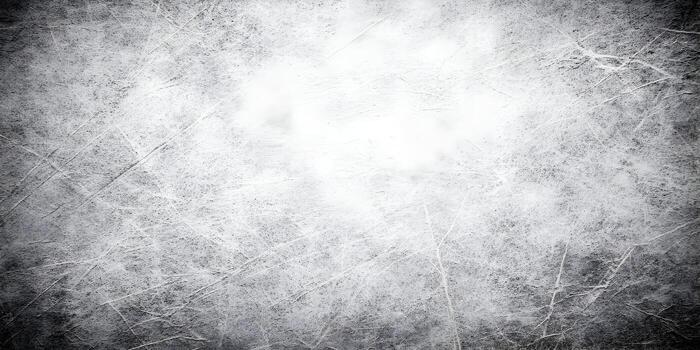 A rough distressed surface background with many white scratches and a dark vignette effect photo