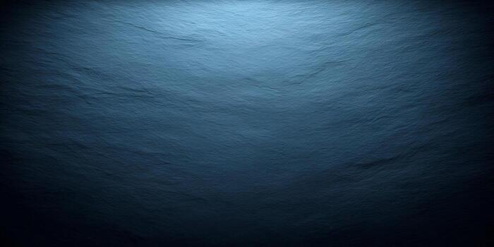 A deep blue textured slate background features a light gradient from the top creating a moody elegant aesthetic photo