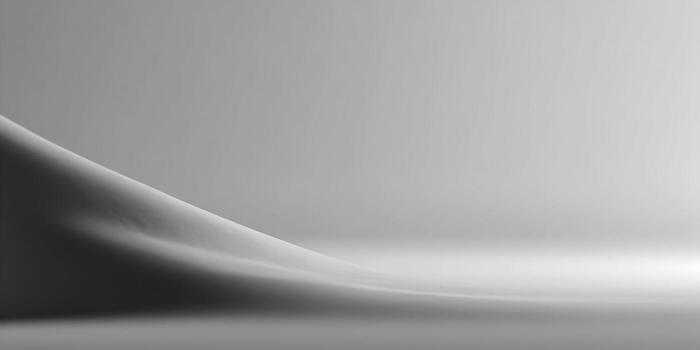 A minimalist gray abstract studio background features smooth curves and subtle light gradients photo