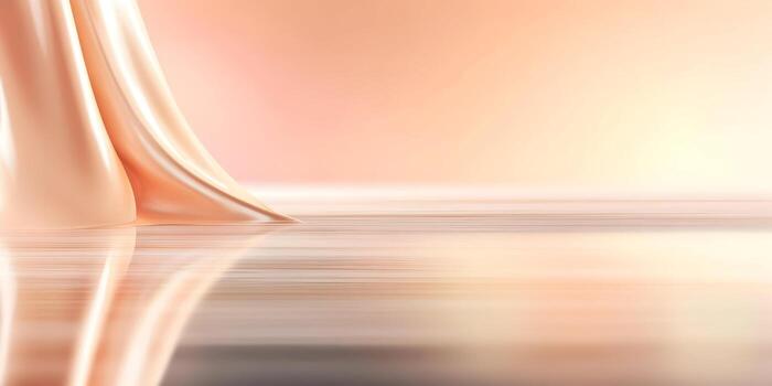 A soft peach colored fabric or liquid flows smoothly over a reflective surface against a gentle gradient background photo