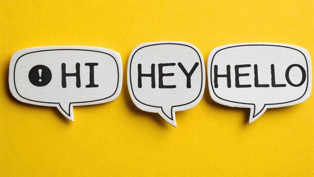 Three speech bubbles with greetings on yellow photo