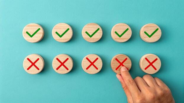 Hand choosing correct and incorrect options photo