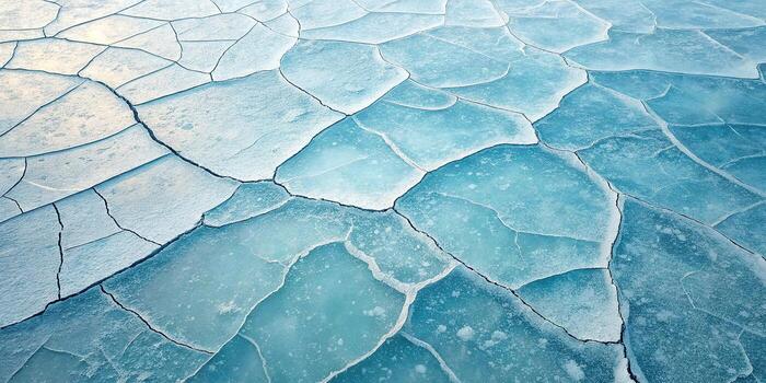 Cracked ice surface texture background in winter season with cold weather photo