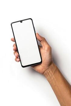Hand holding a smartphone with a blank screen isolated on white background photo